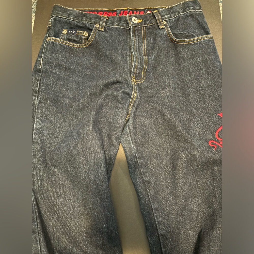 Very cool dark wash jeans with red embroidery